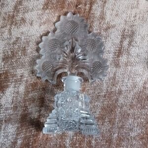 vintage Imperial Glass Co. perfume bottle with a sunflower stopper.
